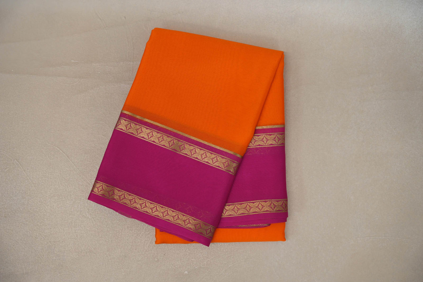 Dark orange with Rani Pink borders Mysore Silk Saree