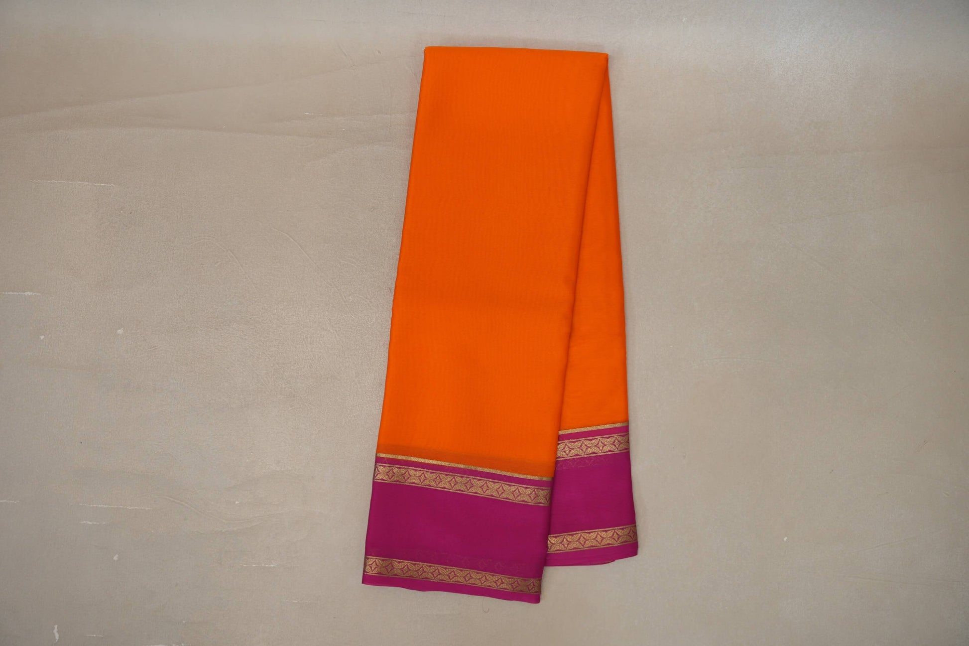 Dark orange with Rani Pink borders Mysore Silk Saree