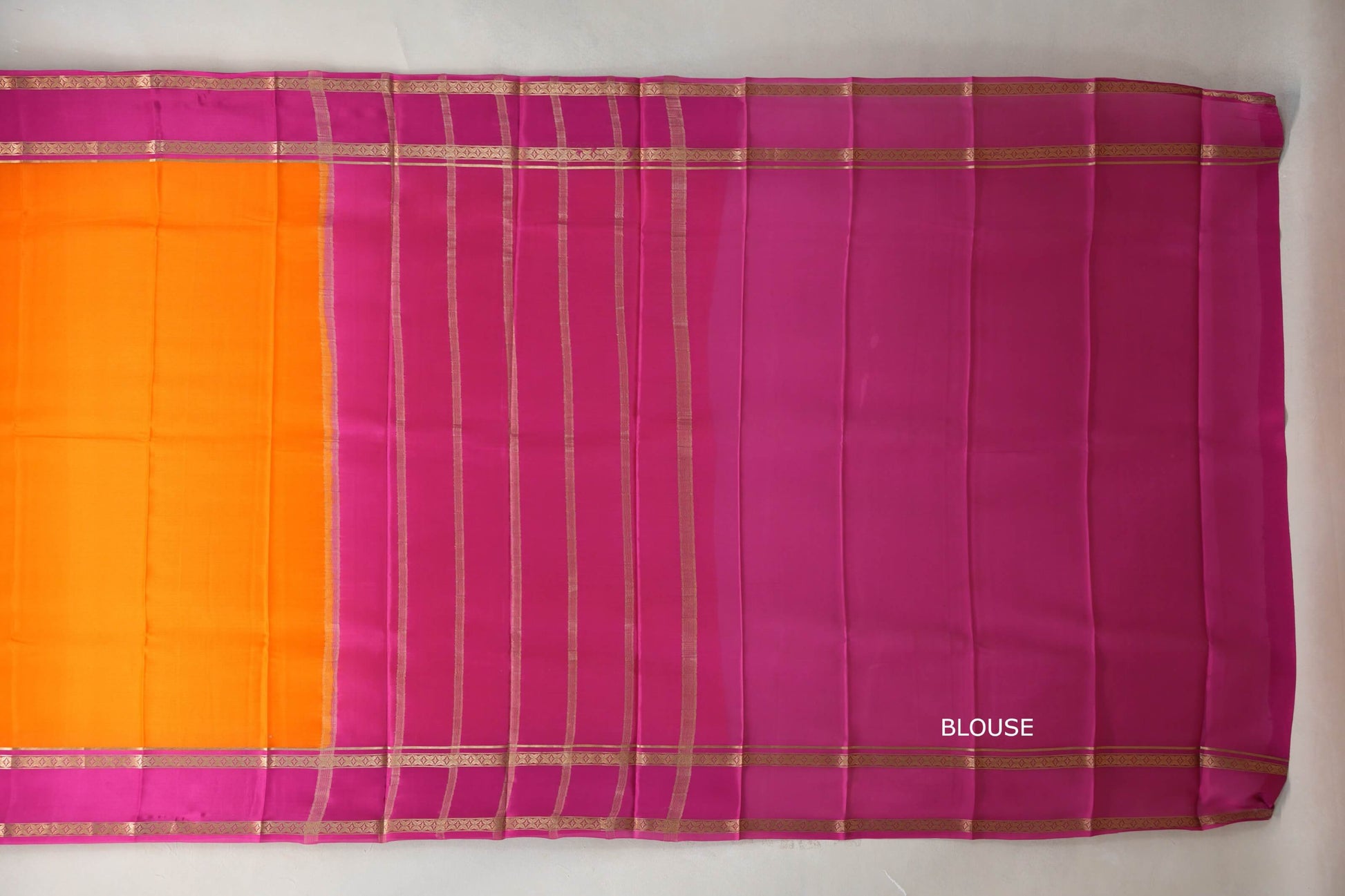 Dark orange with Rani Pink borders Mysore Silk Saree blouse