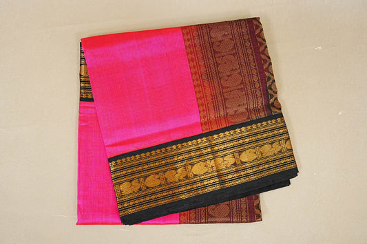 Folded Bright Rani Pink Vaira Oosi Silk Cotton Saree