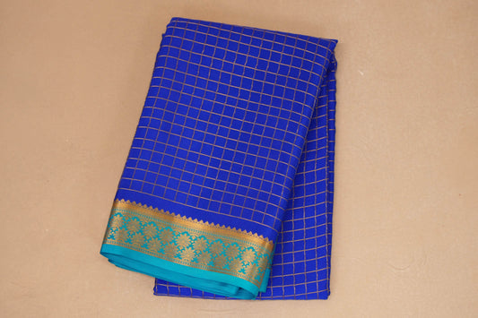 folded royal blue mysore silk saree