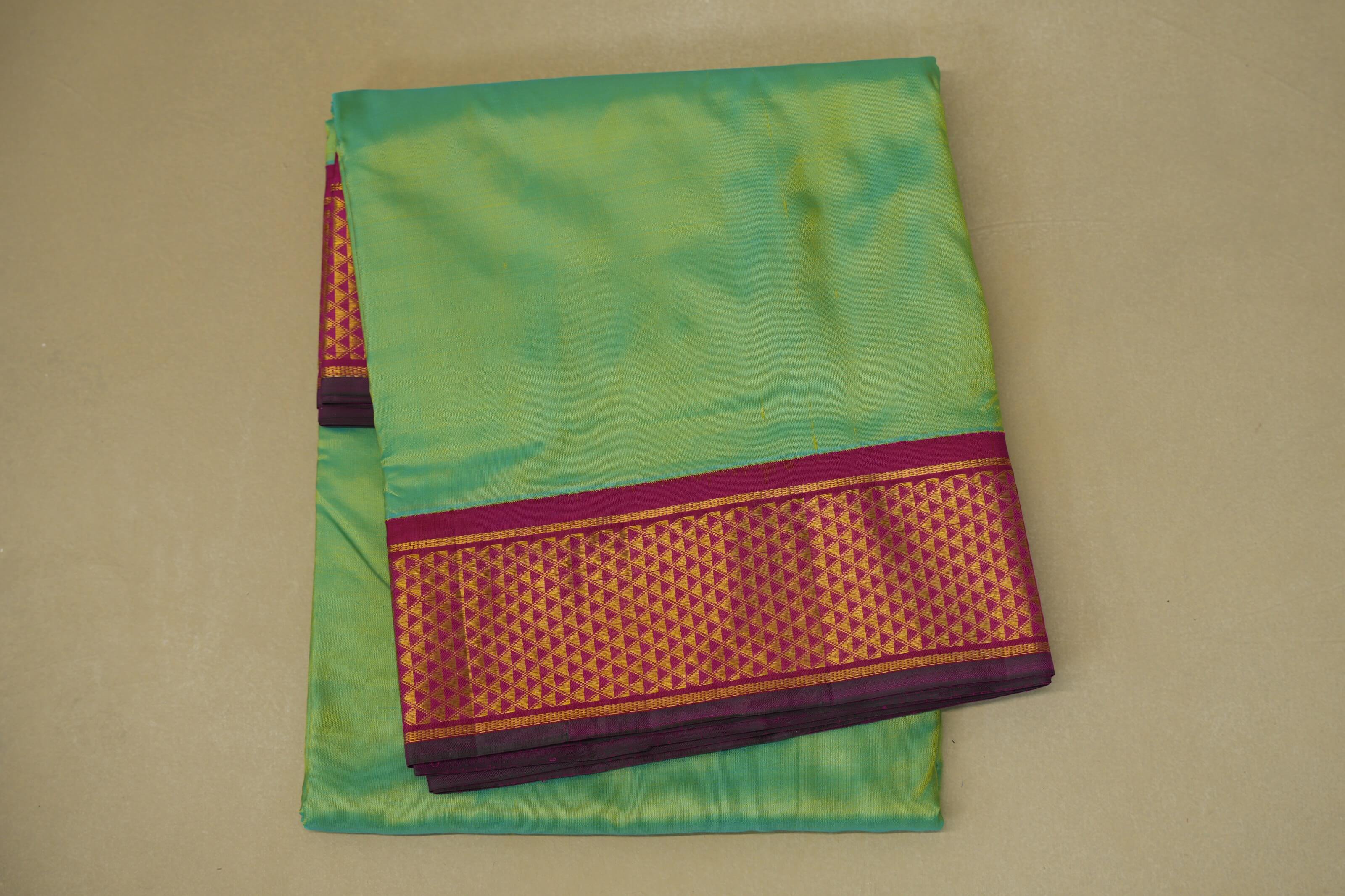 folded Sea Green Ten yards silk Saree 