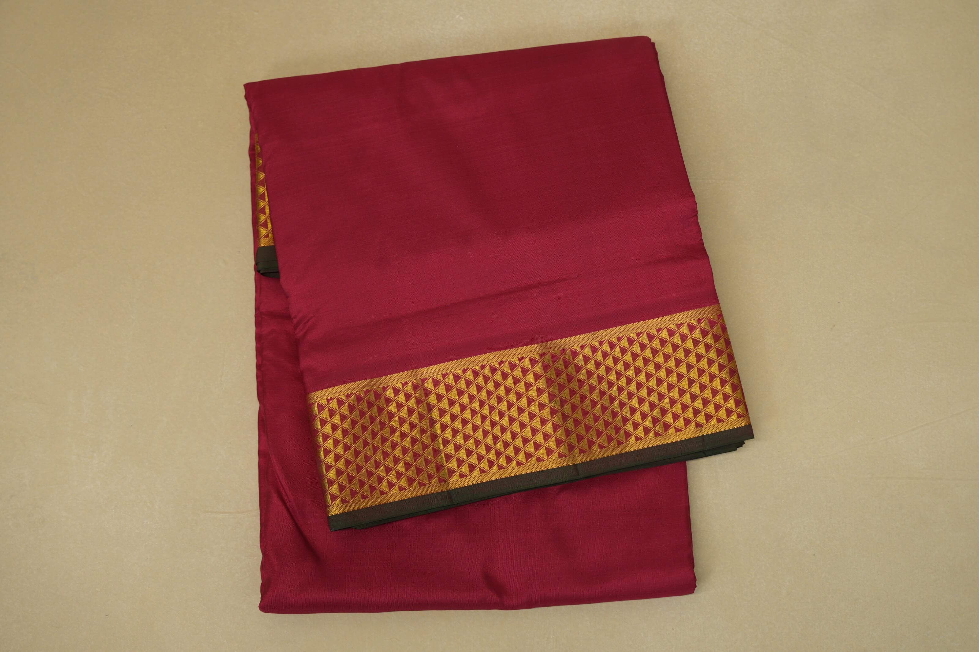 folded Reddish Maroon Ten yards silk saree