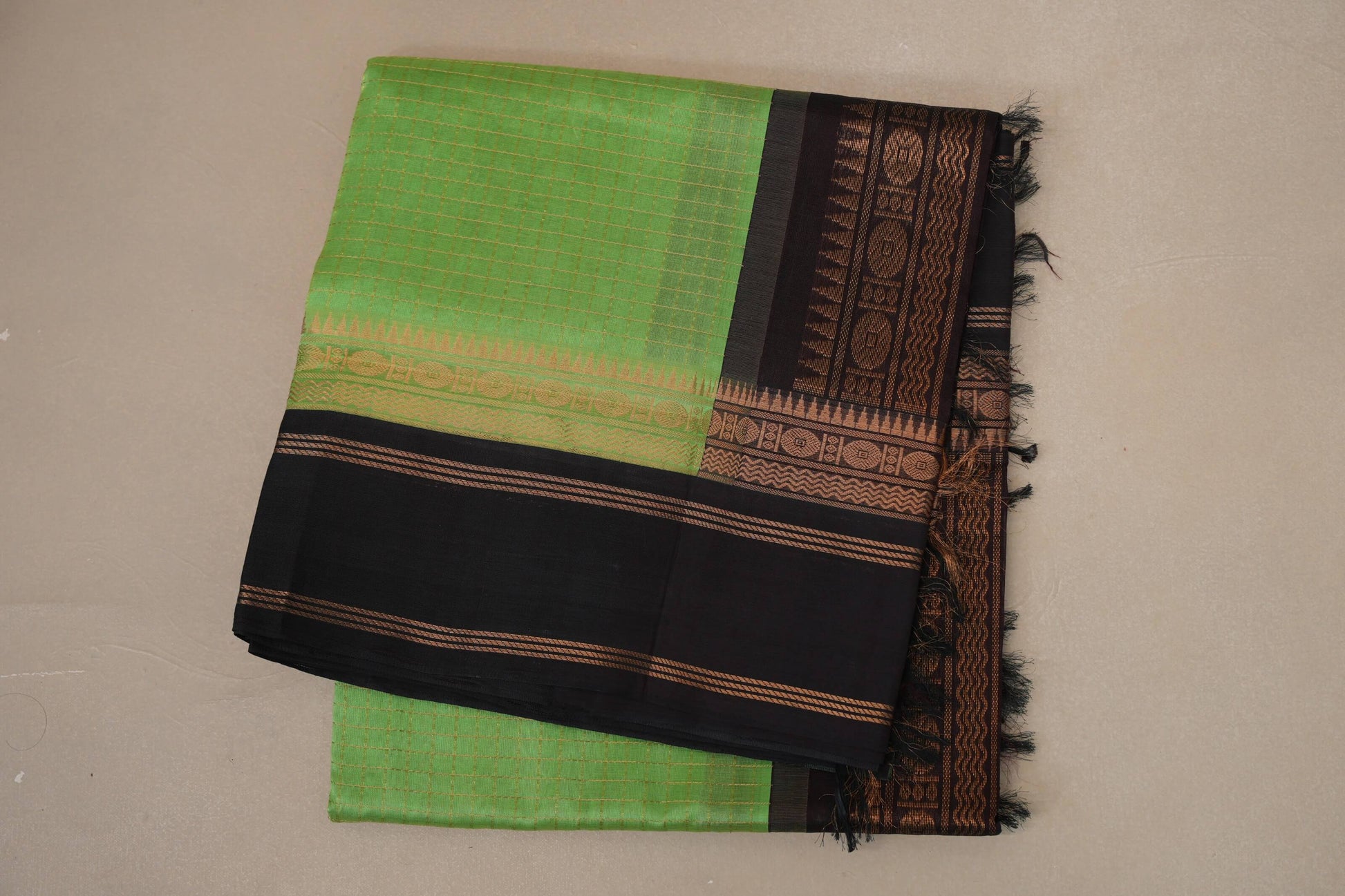 folded Bright Parrot Green Silk Cotton Saree 