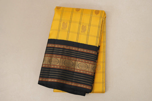 folded Mango Yellow with Black Borders Heirloom Kanjivaram Silk Saree 